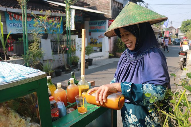 The Royal Route Bicycle Tour - Donning Javanese Clothing