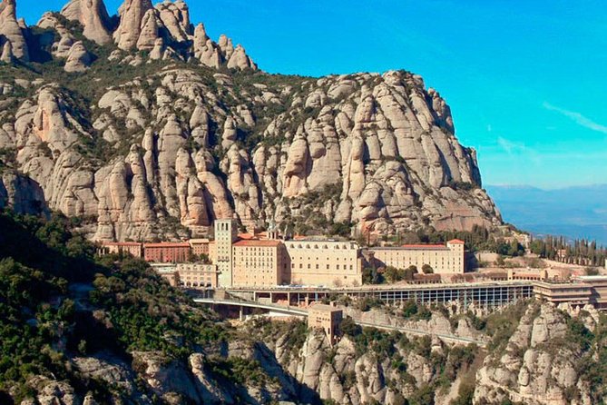 Barcelona to Montserrat: Guided Tour & Return Bus Transfers - Explore Montserrat