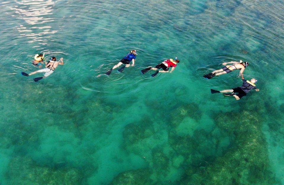 Key West: Reef Snorkel Morning Tour With Breakfast & Mimosas - Coral Reef Navigation With Instructor