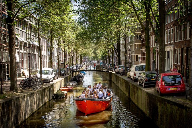 Luxury Boat Tour in Amsterdam With Bar on Board - Guided Experience and Commentary