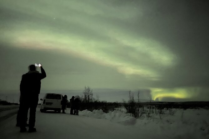 Northern Light Hunt With Minibus to Abisko 7:30 Pm - Bundling Up for Warmth