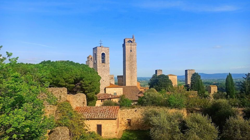 Transfer From Florence to Rome With Stops in San Gimignano and Montepulciano - Taste 5 Exceptional Tuscan Wines in Montepulciano