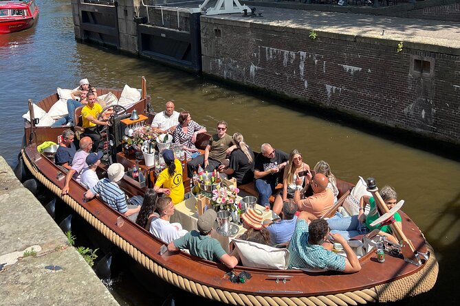 Amsterdam Luxury Boutique Boat Tour With Unlimited Beer and Wine - Booking and Cancellation Information
