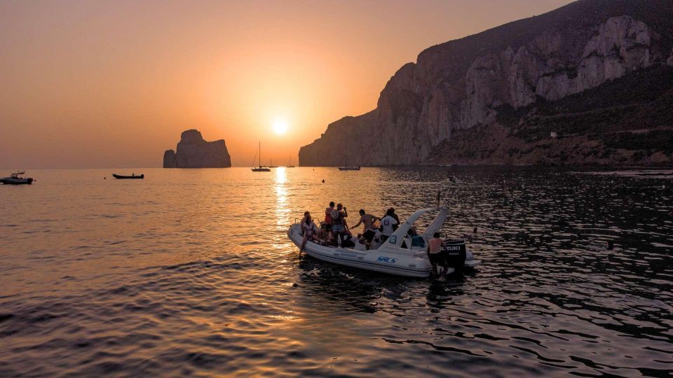 From Cala Domestica: Sunset Boat Tour to Porto Flavia - Live Tour Guide Languages