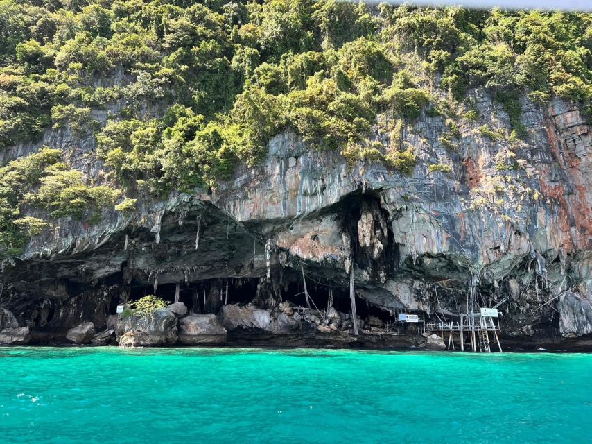 Phi Phi Island: Sunrise Longtail Boat Tour With Snorkeling - Viking Cave Exploration