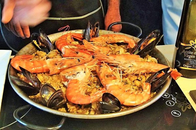 Premium Paella Cooking Class & 10 Spanish Tapas - Convenient Meeting Arrangements