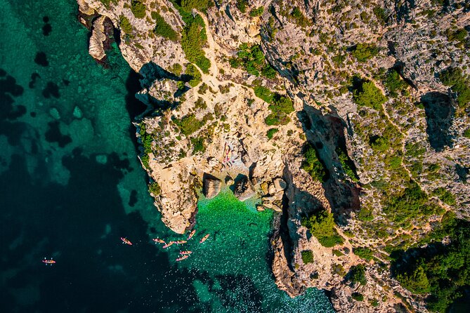 Uncharted Marine Reserve Cave, Snorkel & Cliff Jumping Kayak Tour - Kayaking and Cliff Jumping