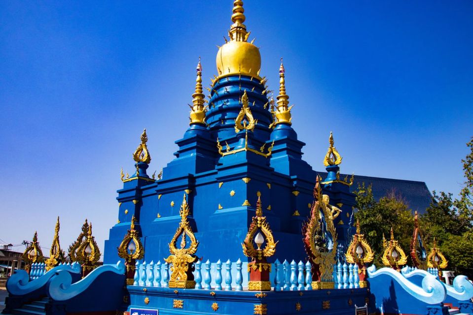 Chiang Mai: Golden Triangle, Blue Temple & White Temple Tour - Golden Triangle and Long-Tail Boat Ride