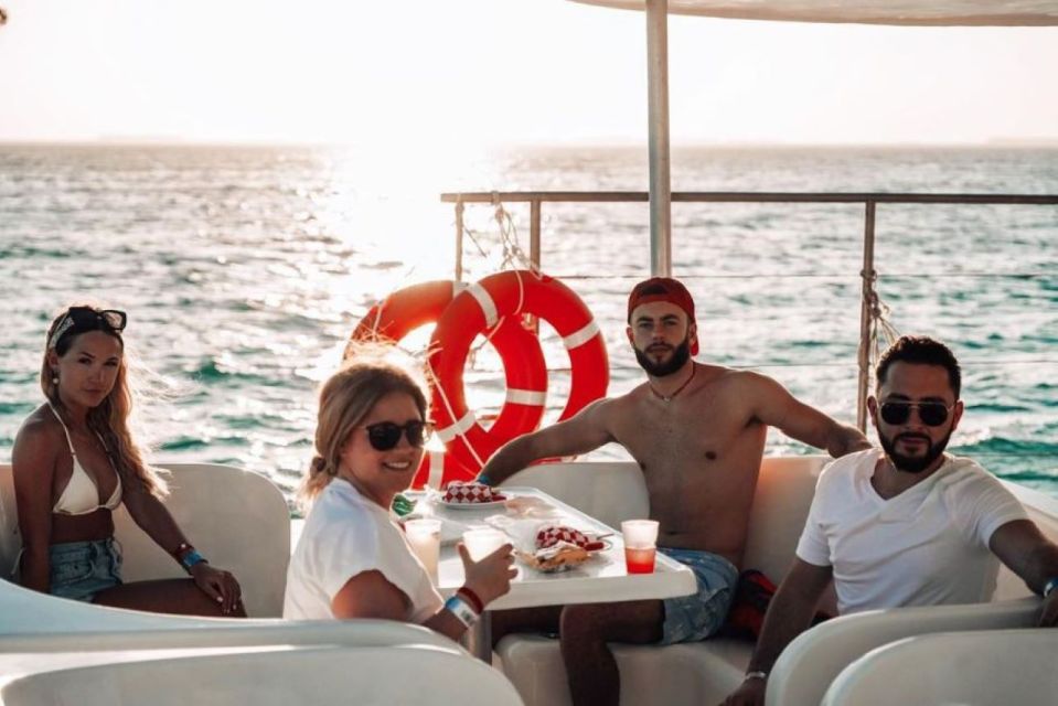 Isla Mujeres Sunset Catamaran With Pick-Up From Cancún - Swim at Playa Norte Beach