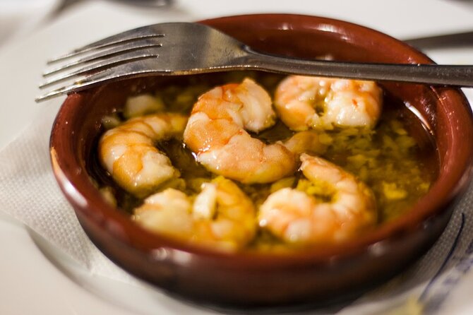 Seville Walking Food Tour With Secret Food Tours - Exploring Sevilles Culinary Scene