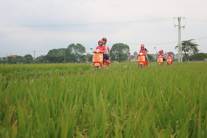 Beautiful Female Riders Vespa Red River Countryside Tour 5 Hours - Key Points