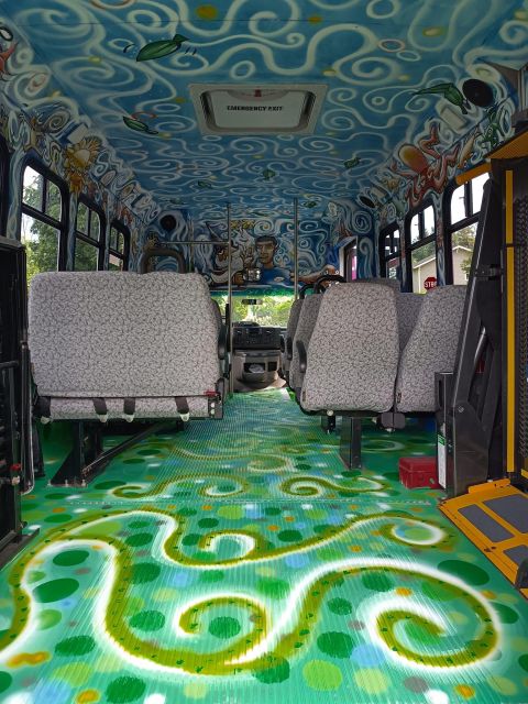 Seattle: Henry Mural Tour, Hop Aboard a Fully Painted Bus - Key Points