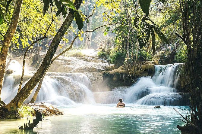 1 DAY Mekong Cruise to Pak Ou Caves. Kuang Si Waterfalls . Local Villages