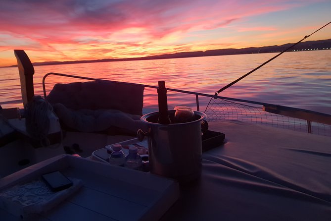 Boat Trip at Sunset + Bottle of Cava + Seafood Tapa - Inclusions in the Package