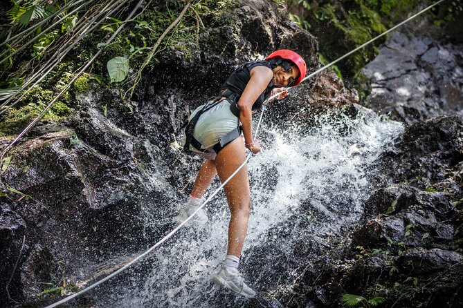 Canyoning Adventure Rappelling Waterfalls in Arenal Volcano