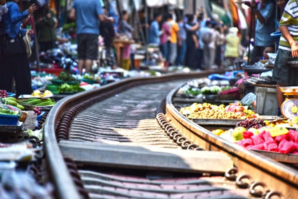 Explore Damnoen Saduak: Floating Market, Train, & Longtail