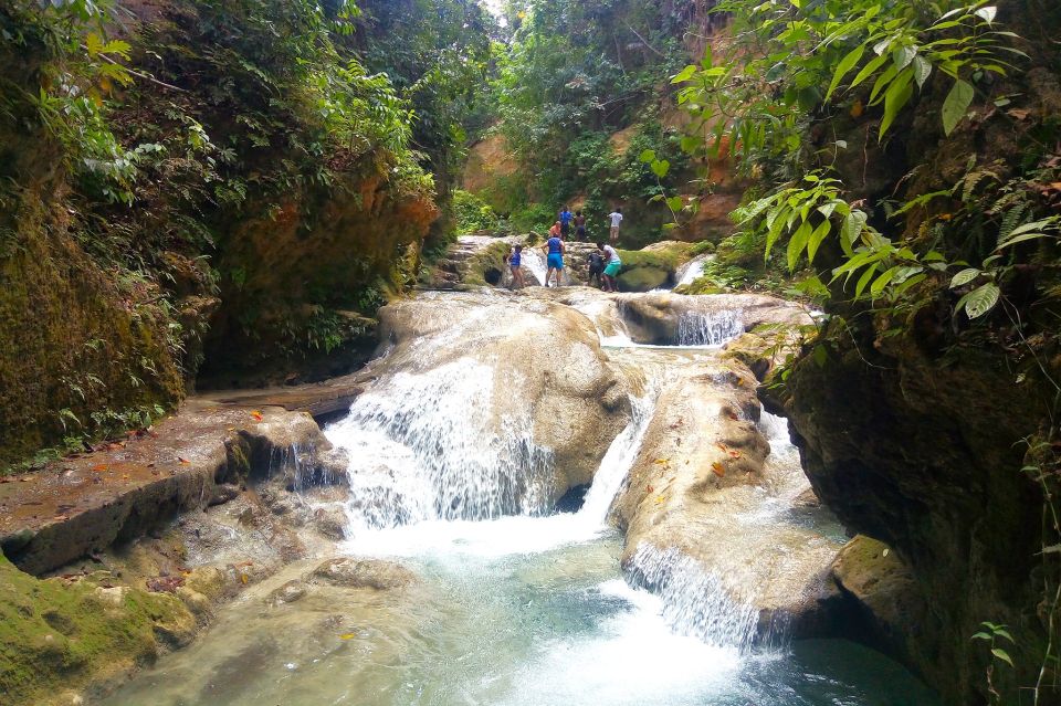 From Falmouth: Waterfalls, Blue Hole and River Tubing Tour