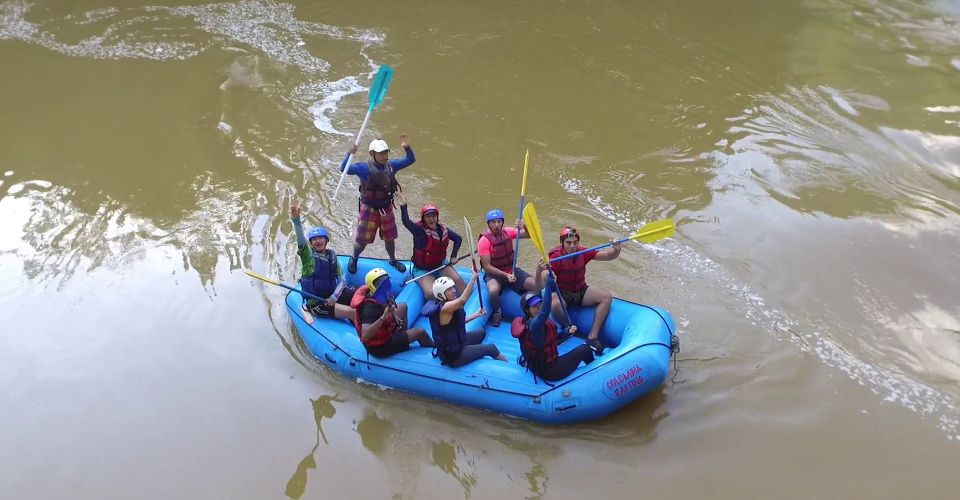 From Medellín: Paragliding and Rafting Combo Tour