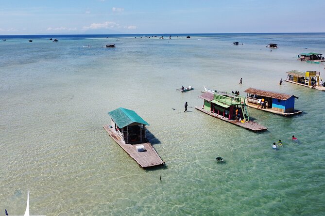 Island Hopping, Snorkeling & Bamboo Cottages Tour From Manila**