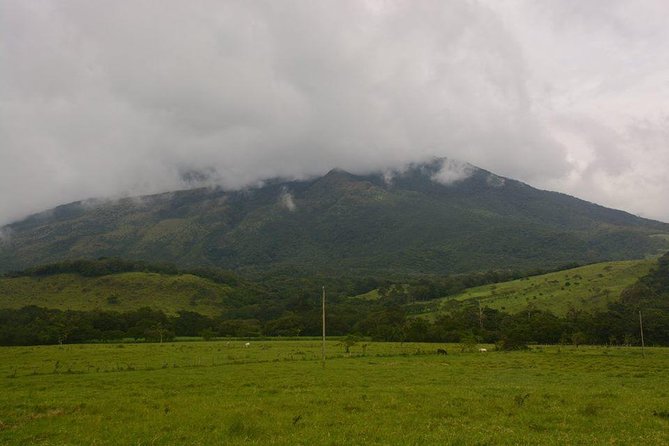 Miravalles Volcano and Waterfalls From Playa Hermosa