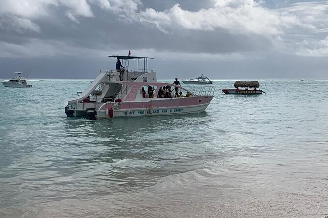 Private Party Boat With Slide and Chicken Skewers at Punta Cana