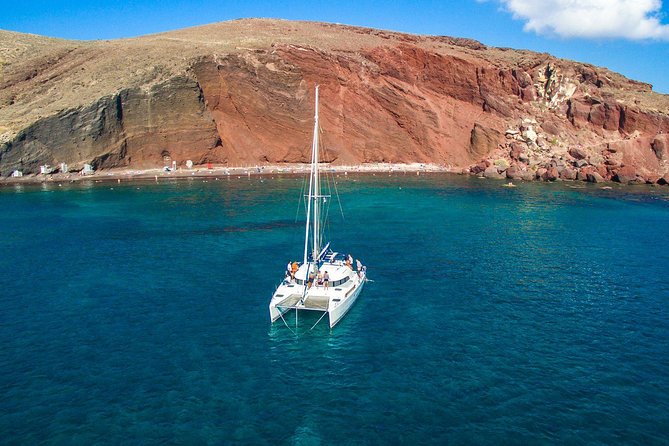 Santorini Half Day Catamaran Private Cruise Incl. Meal, Drinks & Free Transport