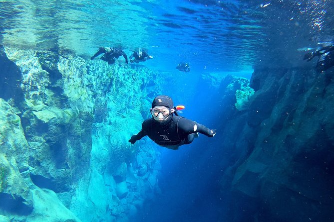 Silfra Wetsuit Snorkeling Tour With Underwater Photos - From Reykjavik - Exploring the Silfra Fissure