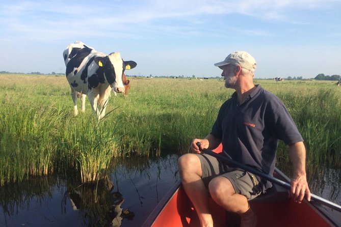 Small-Group Guided Sunset Canoe Tour in Waterland With Dinner