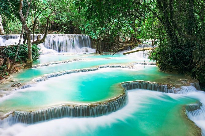 1 DAY Mekong Cruise to Pak Ou Caves. Kuang Si Waterfalls . Local Villages - Exploring the Pak Ou Caves