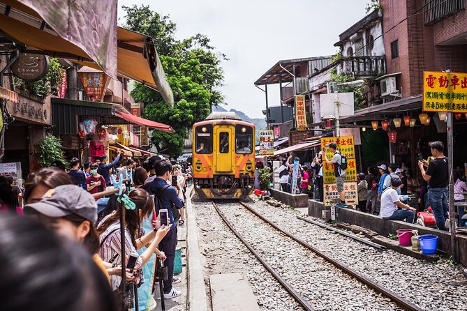 7-Hour Jiufen Night View, Shifen Waterfall & Raohe Market Tour - Itinerary Overview