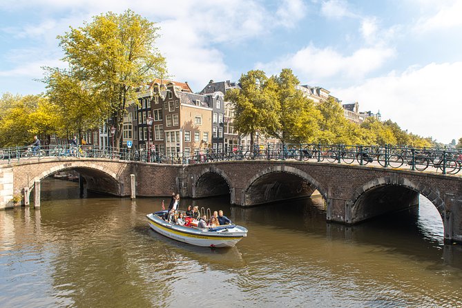 Amsterdam Small-Group Open Boat Tour Off The Beaten Track - Meeting and Pickup Points