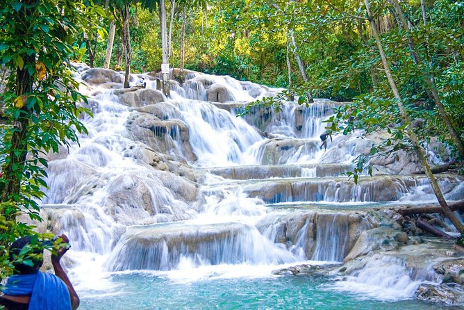 Dunns River Falls, River Tubing, and Horseback Riding With Transportation - Highlights of Dunns River Falls