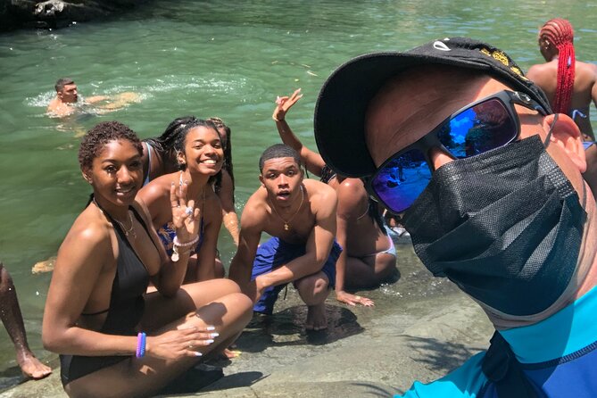 El Yunque: Waterslide, Waterfall, Shopping, and Beach Tour - Meeting and Pickup Details