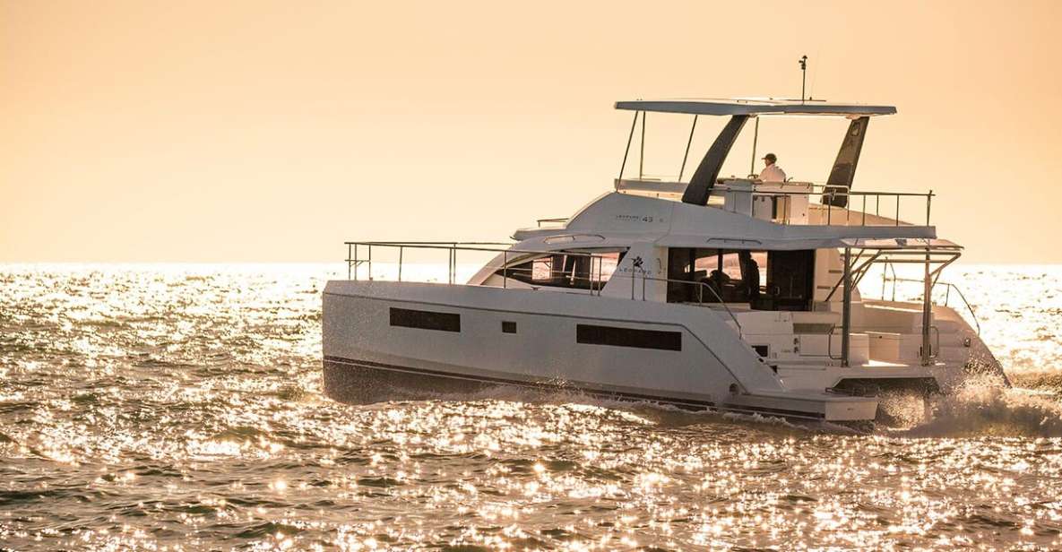 From Rhodes: Private Catamaran Sunset Cruise All Inclusive - Pricing and Group Size