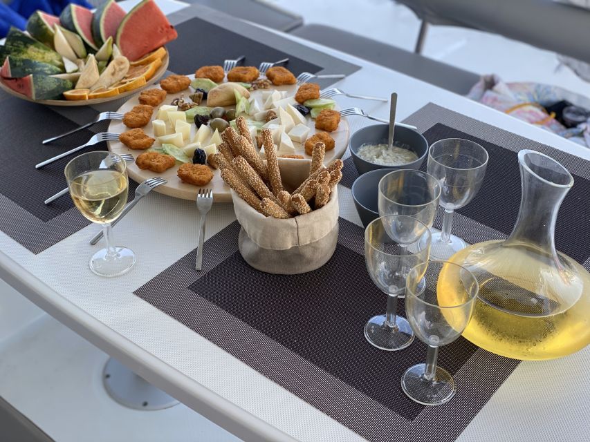 Hersonissos: Sunset Private Catamaran to St George Bay - Itinerary Highlights