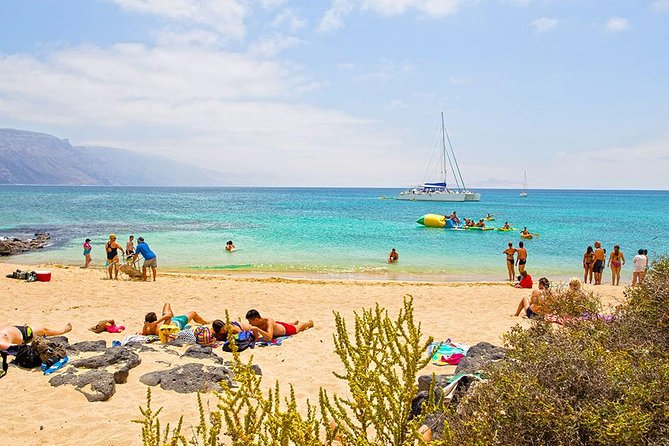 Lanzarote: La Graciosa Island Cruise With Lunch and Water Activities - Catching the Ferry to Caleta De Sebo