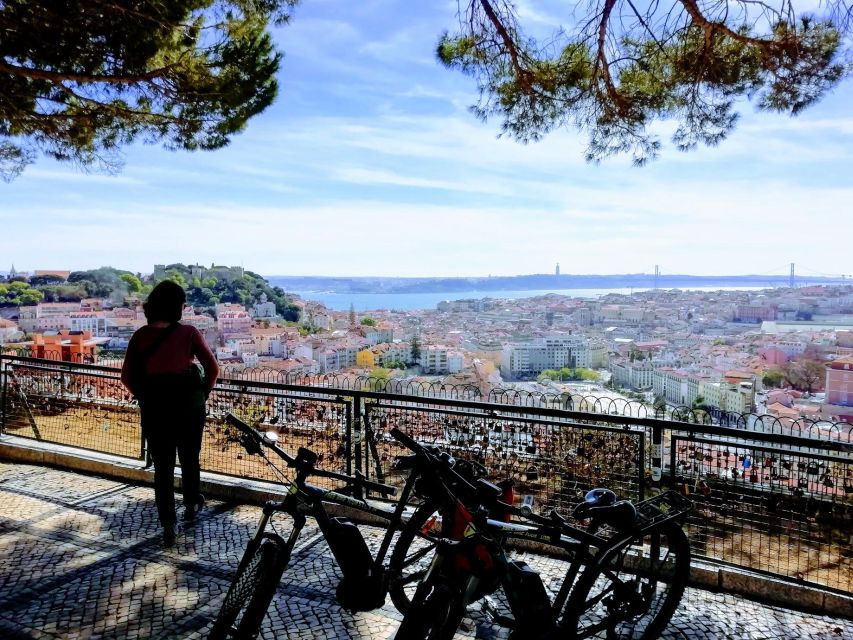 Lisbon: 7 Hills Panoramic Guided Tour by E-Bike - Exploring Alfamas Charming Streets