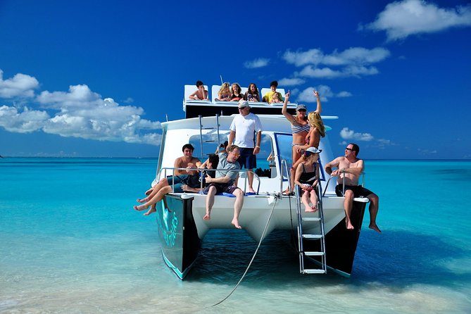 Private 4 Hour Power Catamaran Excursion in Grace Bay - Exciting Activities on the Catamaran