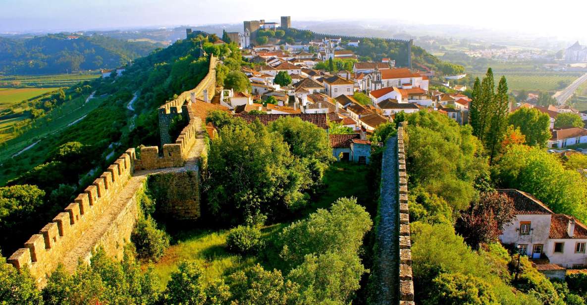 Private Obidos, Nazare, Alcobaça and Mafra Full Day Tour - Itinerary Overview