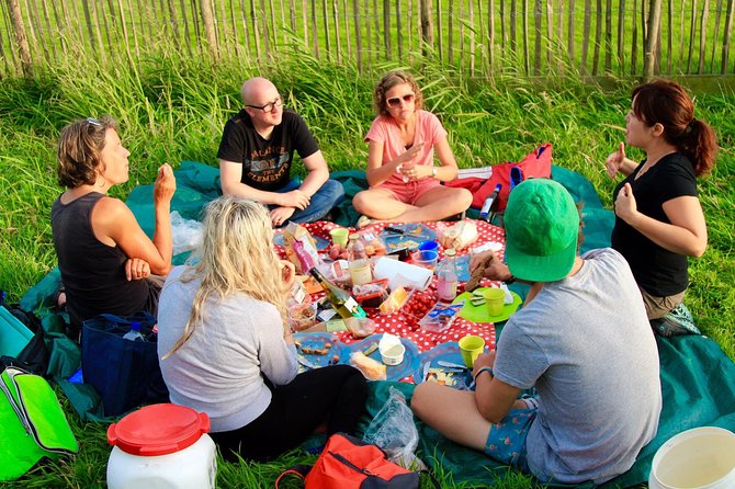 Small-Group Guided Sunset Canoe Tour in Waterland With Dinner - Scenic Experience