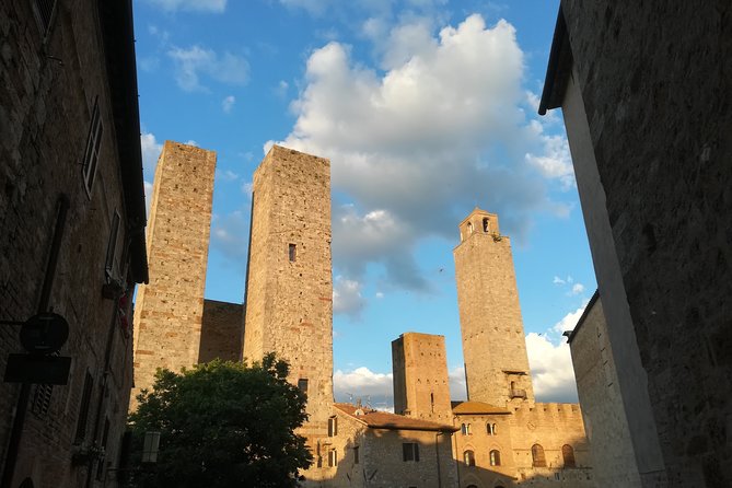 Small-Group San Gimignano and Volterra Day Trip From Siena - Discovering San Gimignanos Highlights