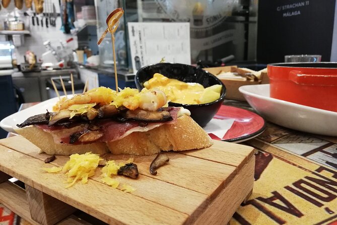 Wine and Tapas Walking Tour in Malaga - Tour Details and Logistics