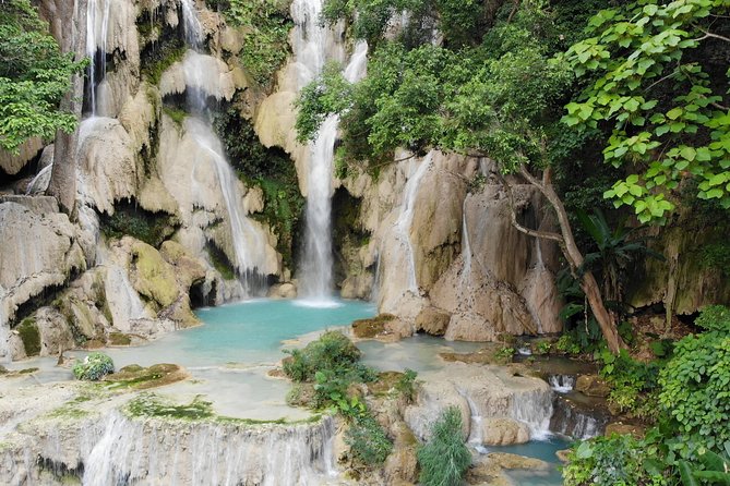 1 DAY Mekong Cruise to Pak Ou Caves. Kuang Si Waterfalls . Local Villages - Savoring Lunch at the Elephant Camp