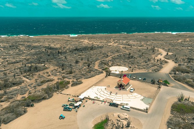 Aruba Jeep Tour: Natural Pool, Caves, and Baby Beach Adventure - Admiring the Natural Bridge