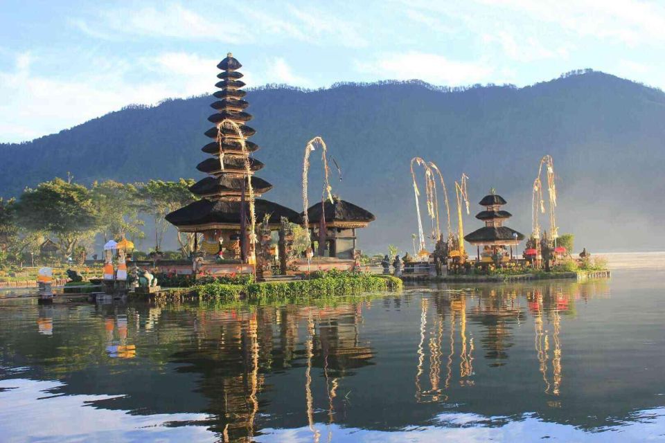 Bali: Lovina Beach Boat Ride & Ulun Danu Beratan Temple Tour - Unraveling Gitgit Waterfalls Jungle Charm