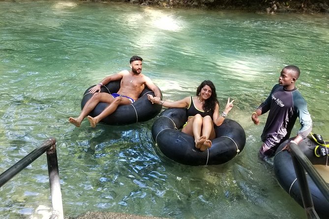 Dunns River Falls, River Tubing, and Horseback Riding With Transportation - White River Tubing Experience