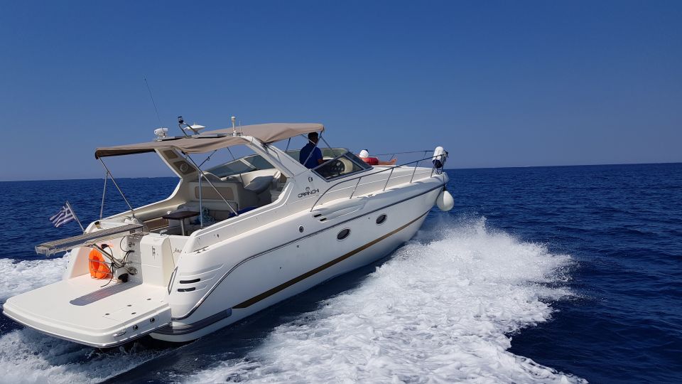 Fira: Private Sunset Cruise With Bbq, Drinks and Hot Springs - Dining and Refreshments