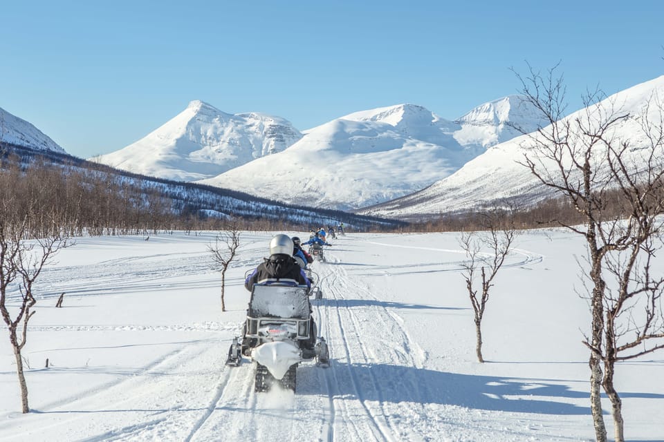 From Tromsø: Snowmobiling Tour at Camp Tamok - Key Highlights