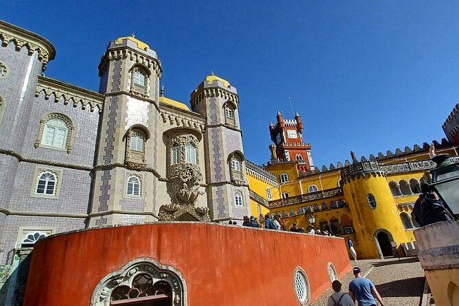 Group to Pena Palace, Sintra (pass by Regaleira) and Cascais - Exploring Regaleira En Route