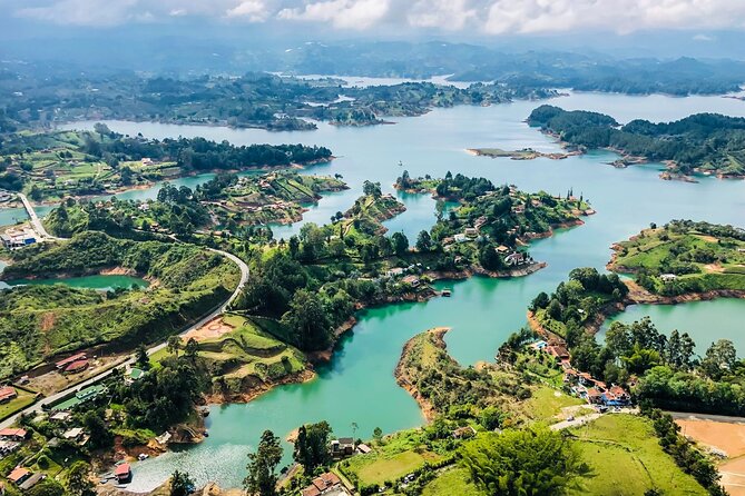 Guatapé Stone of Peñol Excursion + Gastronomic Tour and Cruise on the Dam - Climbing Experience at Guatapé